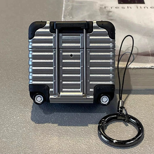 ✈️ Mini Valise Protectrice pour AirPods — L’accessoire qui voyage avec vous